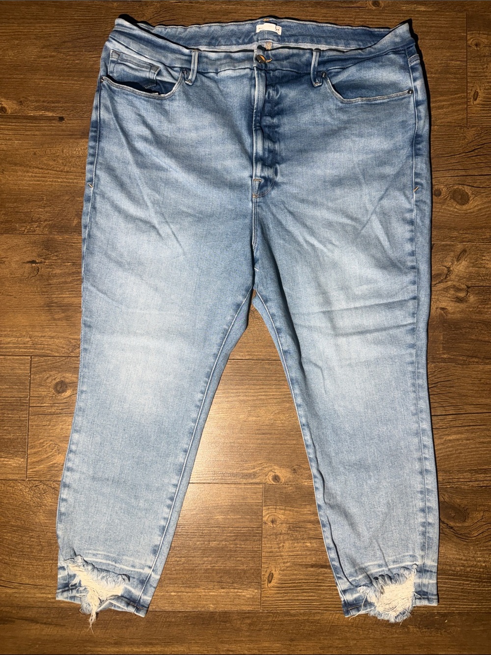 Good American Light Blue Relaxed Jeans with Distressed Hem